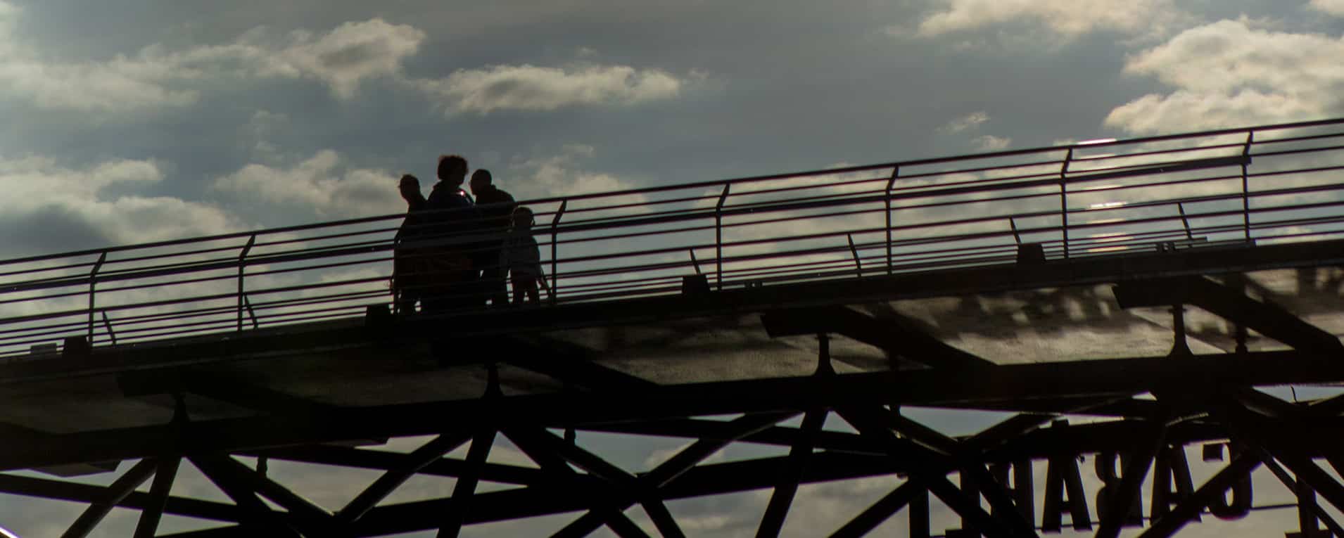 Footbridge at Parc de la Villette at sunset.